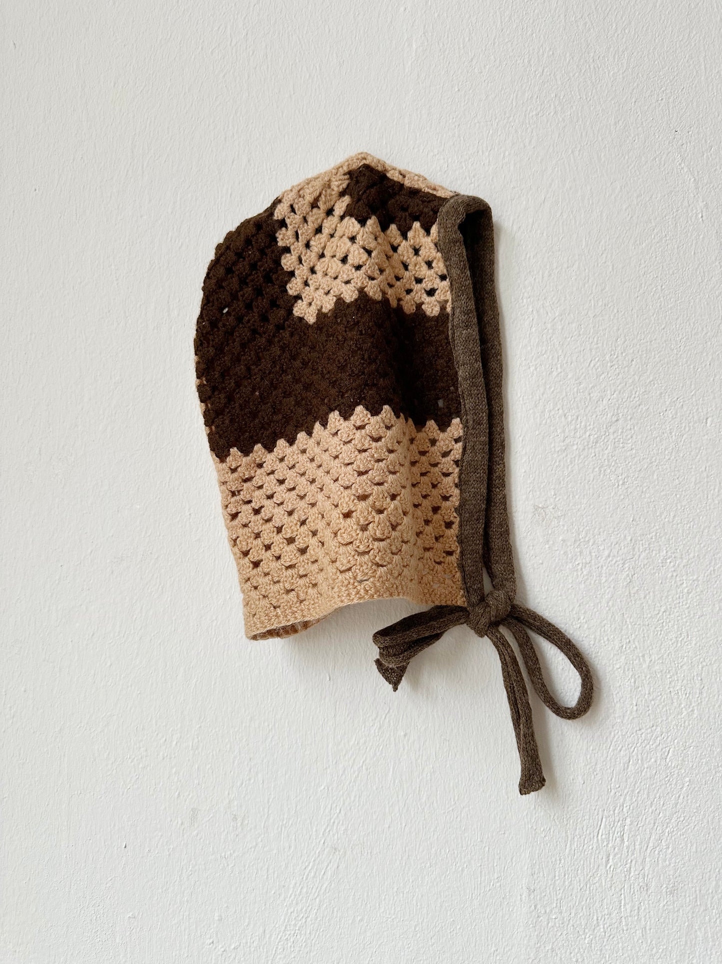 Beige and brown crochet bonnet detailed view