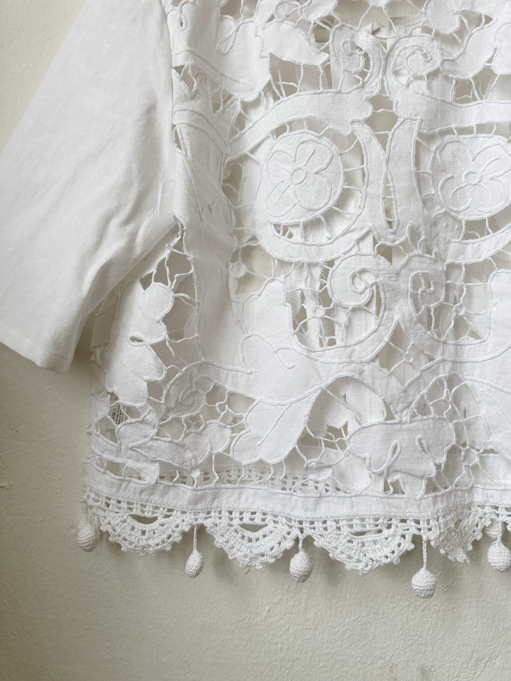 Handmade vintage lace blouse with pom pom hem detail, short sleeves, made from a Bologna thrift store curtain