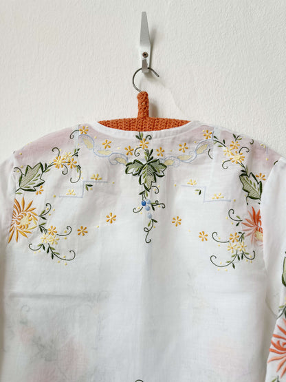 Handmade sheer vintage embroidered floral blouse with short sleeves, made from a Scottish antique market tablecloth