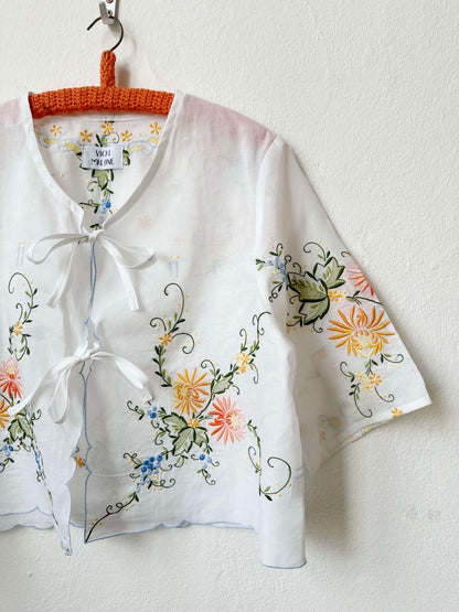 Handmade sheer vintage embroidered floral blouse with short sleeves, made from a Scottish antique market tablecloth