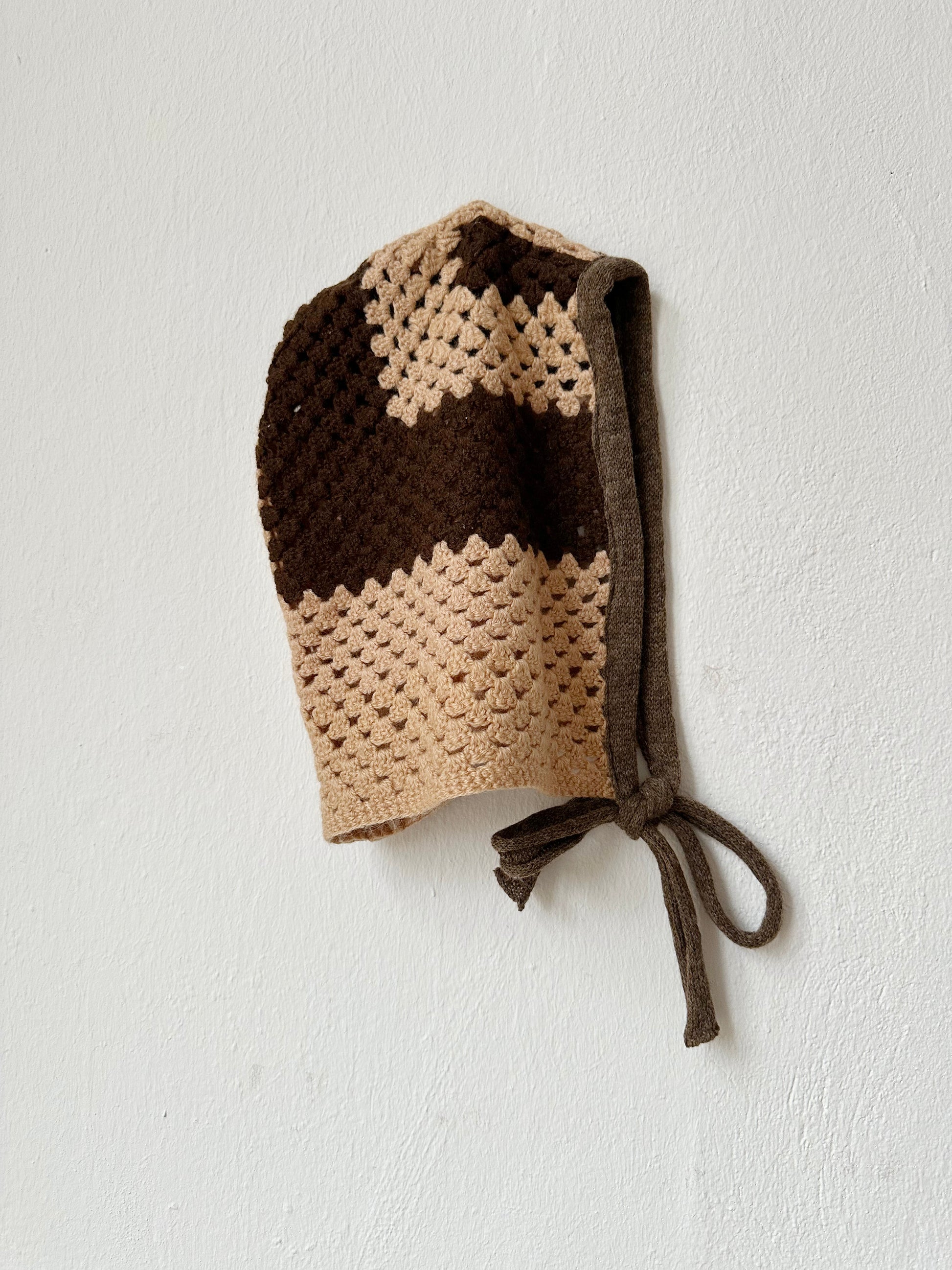 Beige and brown crochet bonnet detailed view